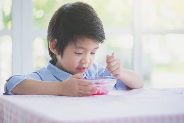 Happy Little Asian Child Eating Shaved Ice Home Stock Picture