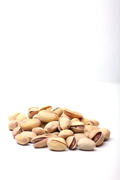 Pistachio nuts isolated on white background — Stock Photo, Image