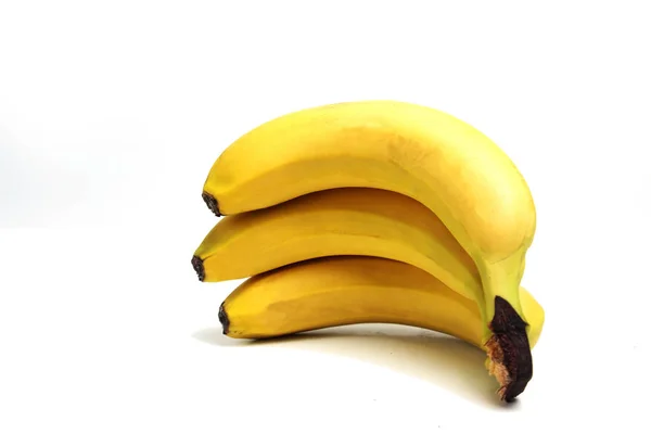 Tre bananer isolerad på vit bakgrund — Stockfoto