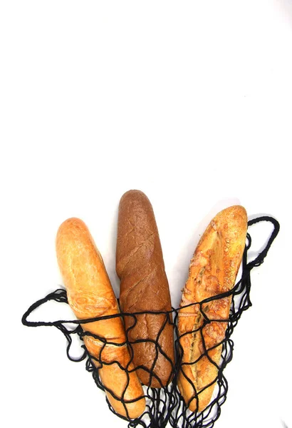 Drie Stokbrood Een Touwtje Zak Geïsoleerd Witte Achtergrond Plat Leggen — Stockfoto