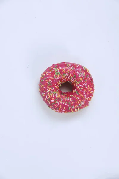 Rosado Donut Aislado Sobre Fondo Claro Plano Laico Imagen Contiene — Foto de Stock