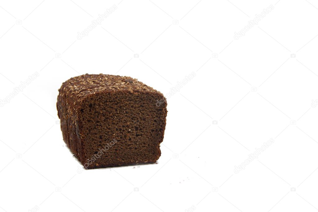 cut pumpernickel bread isolated on white background. Image contains copy space