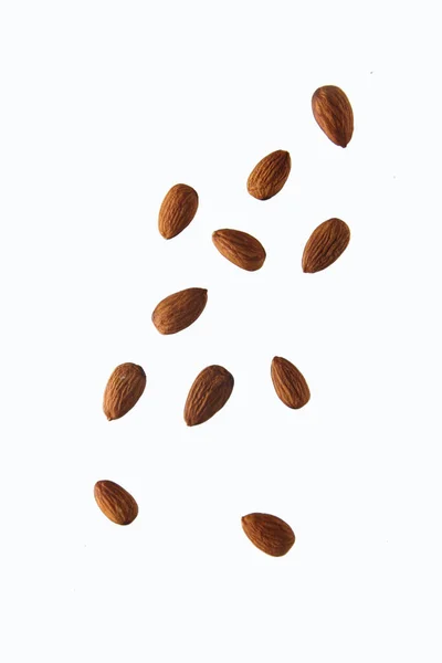 Pouring Almond White Background Concept Flying Food Image Contains Copy — Stock Photo, Image