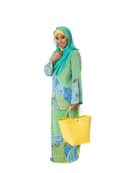 Beautiful asian muslimah woman with bright wicker tote bags.Isolated — Stock Photo, Image