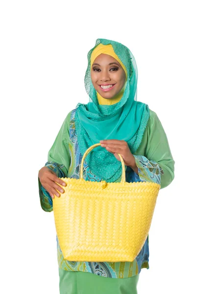 Beautiful asian muslimah woman with bright wicker tote bag.Isolated — Stock Photo, Image