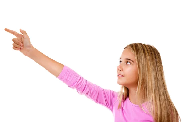 Muchacha joven atractiva señalando su dedo.Aislado —  Fotos de Stock