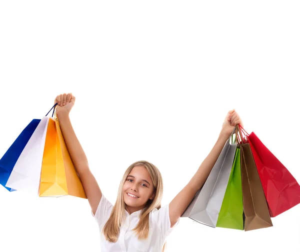 Szczęśliwy nastoletnie dziewczyny w odzieży casual z torby na zakupy, na białym tle — Zdjęcie stockowe