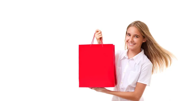 Shopping, sale, christmas and holiday-lovely young girl with red shopping bag,isolated — Stock Photo, Image