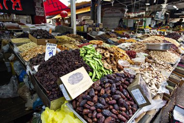 TEL AVIV, ISRAEL - December 2019: Fruit and vegetable stall on the Carmel Market, Shuk Carmel, in Tel Aviv, Israel