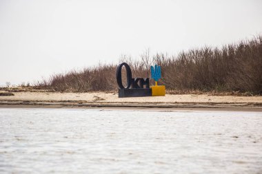 VILKOVE, UKRAINE - April 2018: Zero kilometer monument at Danube Delta, Vilkove, Ukraine