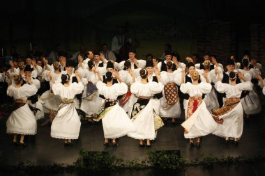 TIMISOARA, ROMANIA- 12. 10.2014 Romanian dancers in traditional costume, perform a folkore traditional dance.