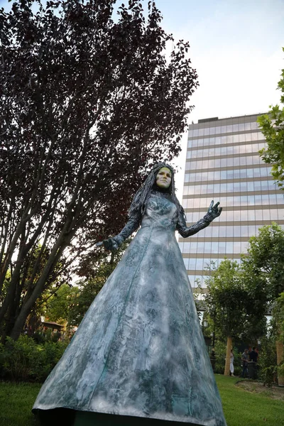 Timisoara, Romania- 09.06.2019 Living statue of a Goddess of the forrest. Woman dressed in silver dress pose as a realistic human statue. — Stock Photo, Image