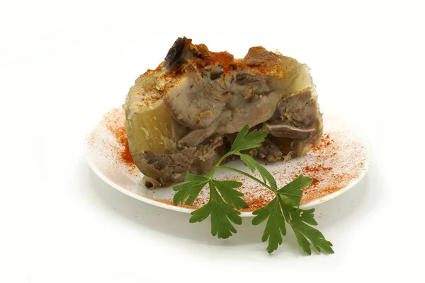 Traditional Romanian homemade pork trotter jelly dish called piftie. Jellied pork aspic made with pork meat served with paprika and fresh parsley. — Stock Photo, Image