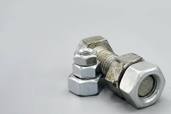 Stainless Steel Screws Nuts Isolated Gray Background New Shiny Chrome — ストック写真