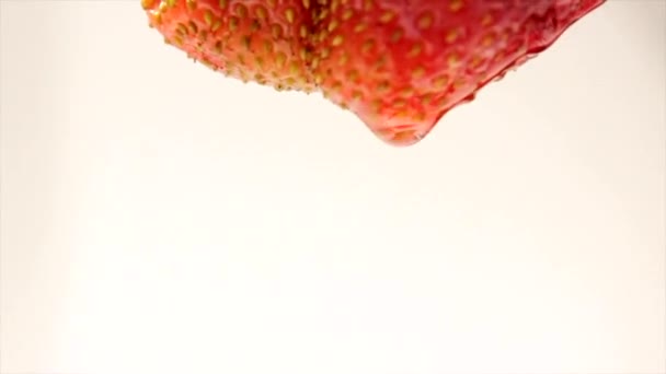 Strawberries Pulled Out Water Droplets Fall — Stock Video