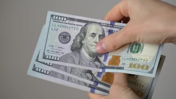 Man Counts Dollar Bills — Stock Video