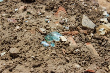 Ancient glass at the site of archaeological excavations clipart