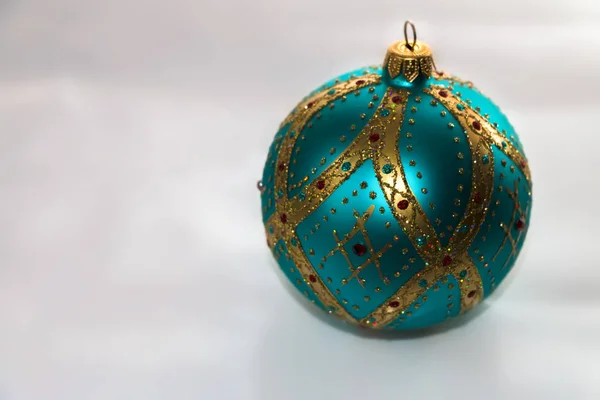 Turquoise Gilding Christmas Ball White Surface — Stock Photo, Image