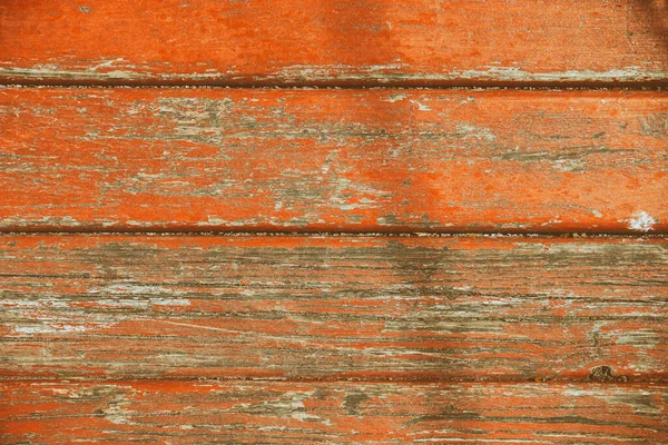 Background, texture of old wood paneling with peeling paint.