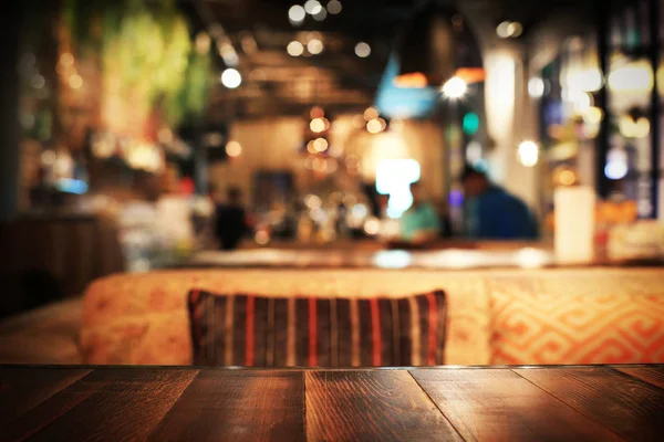 Wooden table in a cafe — Stock Photo, Image