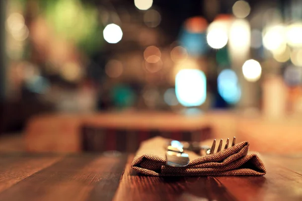 Wooden table in a cafe — Stock Photo, Image