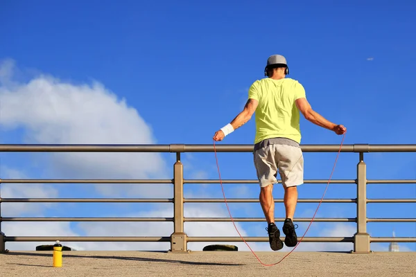 Morning exercises with skipping rope — Stock Photo, Image