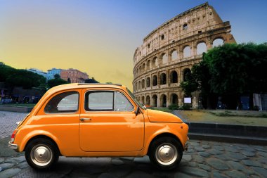 Retro car on background of Colosseum in Rome Italy clipart