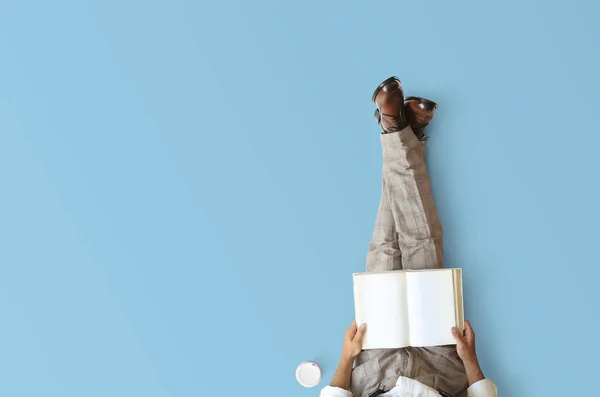 Young Man Sitting Reading Book Floor Education Concept — Stock Photo, Image