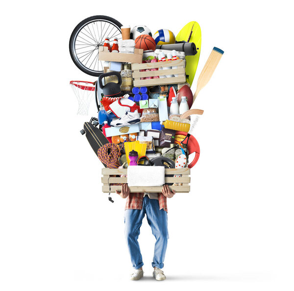 Healthy lifestyle concept, a man holds a box with vegetarian products and sports equipment