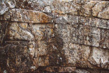 Taş doku arka plan. Taş doku arka planının yakın. Renkli doğal taş arka plan. Büyüleyici doku ile ilginç arka plan.