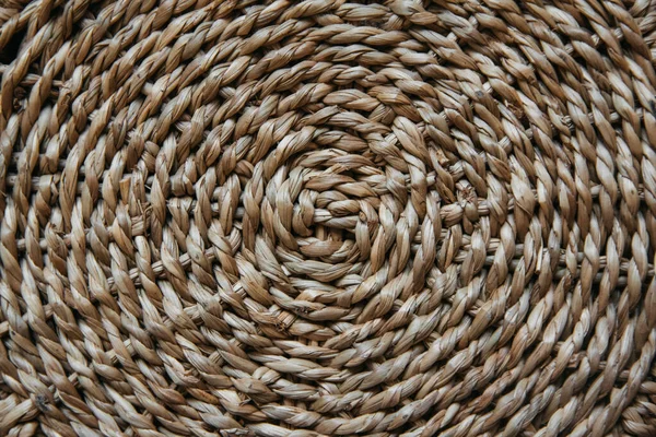 Structure and background of a wicker basket. Pattern of round texture. Close up. — Stock Photo, Image