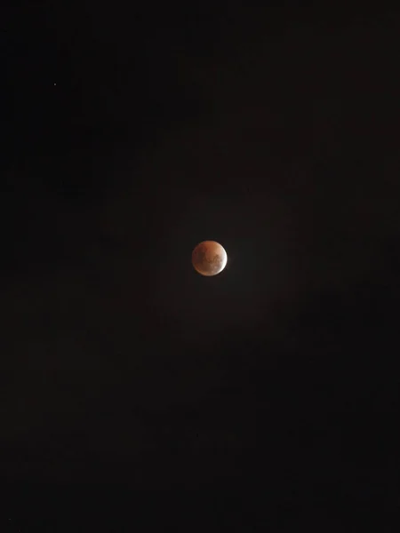 Bright and large super moon at closest point to Earth on January 2018.Total Lunar Eclipse. Black background, close up, telephoto. Astrology, astronomy