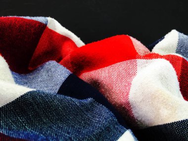 Peştamal ya da İskoç Doku Biçimi siyah arkaplanda izole.