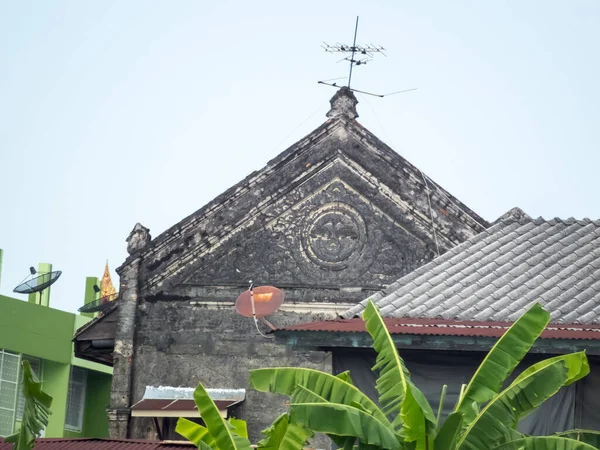 Old buildings abandoned over 100 years old. Chao Phraya River, Bangkok, Thailand.