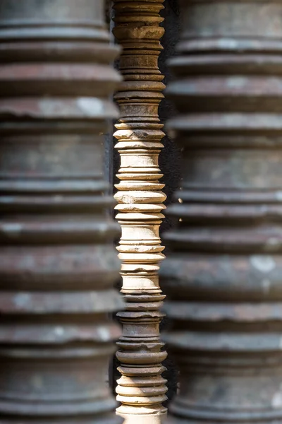 Stone pillar window decor in Banteay Samre temple in Cambodia