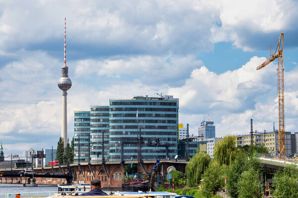 The river Spree with the Interior Ministry seen from the Holsteiner Ufer in the Tiergarten district of Berlin, Germany