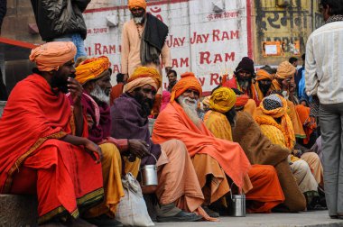 Varanasi, India - Dec 23, 2019: Sadhu at the ghats in Varanasi in India