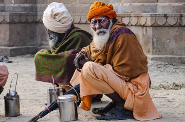 Varanasi, India - Dec 23, 2019: Sadhu at the ghats in Varanasi in India
