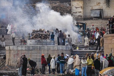 Varanasi, India - Dec 26, 2019: Cremation of bodies at the Manikarnika Ghat