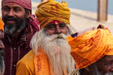 Varanasi, India - Dec 23, 2019: Sadhu at the ghats in Varanasi in India