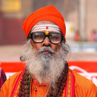 Varanasi, India - Dec 23, 2019: Sadhu at the ghats in Varanasi in India
