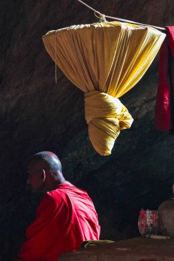 Hpa-an, Myanmar - Nov 06, 2019: Monk inside of Kaw Ka Thaung Cave