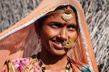 Jaisalmer, India - Jan 01, 2020: Rajasthani gypsy woman in traditional attire