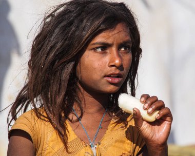 Jaisalmer, India - Dec 31, 2019: Rajasthani gypsy woman in traditional attire