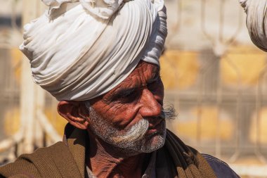 Jaisalmer, India - Dec 31, 2019: Rajasthani people in national clothes in Jaisalmer