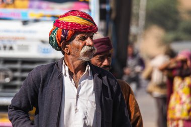 Jaisalmer, India - Dec 31, 2019: Rajasthani people in national clothes in Jaisalmer