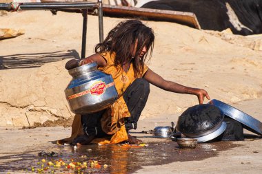Jaisalmer, India - Dec 31, 2019: Rajasthani gypsy woman in traditional attire