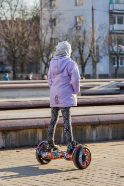 Girl on GyroScooter. Hover Board clipart