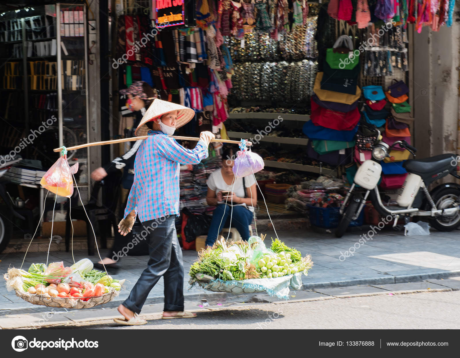 Vietnamese street vendors act and sell their vegetables and fruit ...