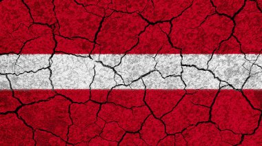 Düzenlenmiş beyaz bir taş duvar Letonya bayrağı